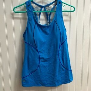Athleta Running top with a pouch in the back. Bra padded. Size M